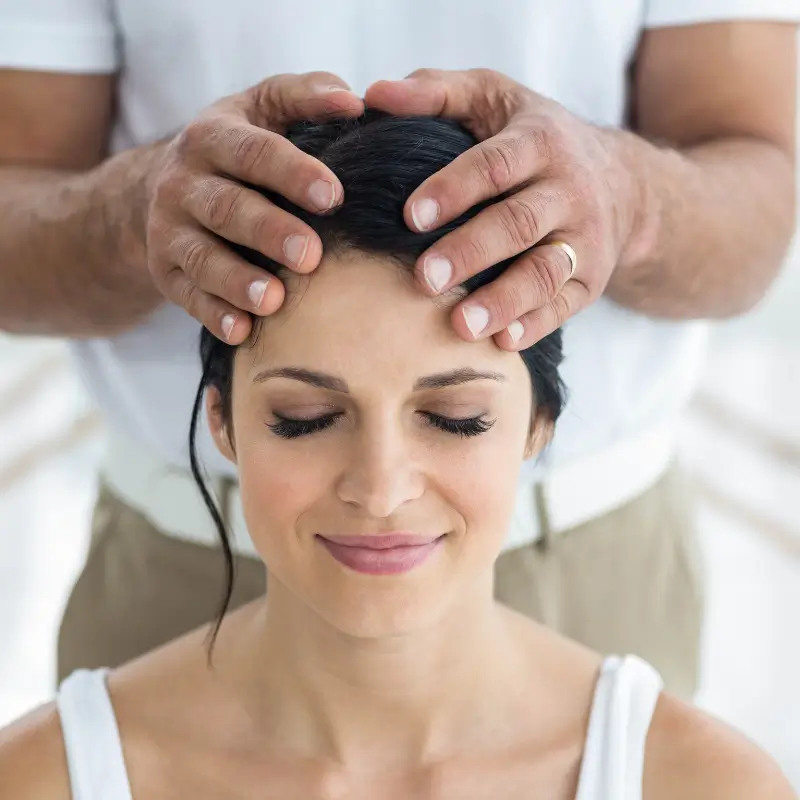 Woman receiving gentle chiropractic treatment for headache relief – Chiropractor Melbourne
