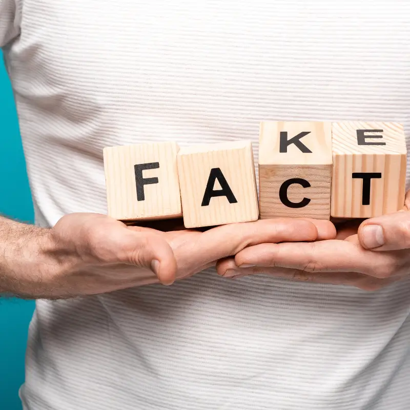 Colonic myths vs facts represented by wooden blocks spelling fake and fact